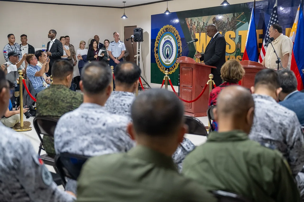 Philippine Defence Secretary Gilberto Teodoro Jr. speaks at a podium during a joint press briefing in Palawan