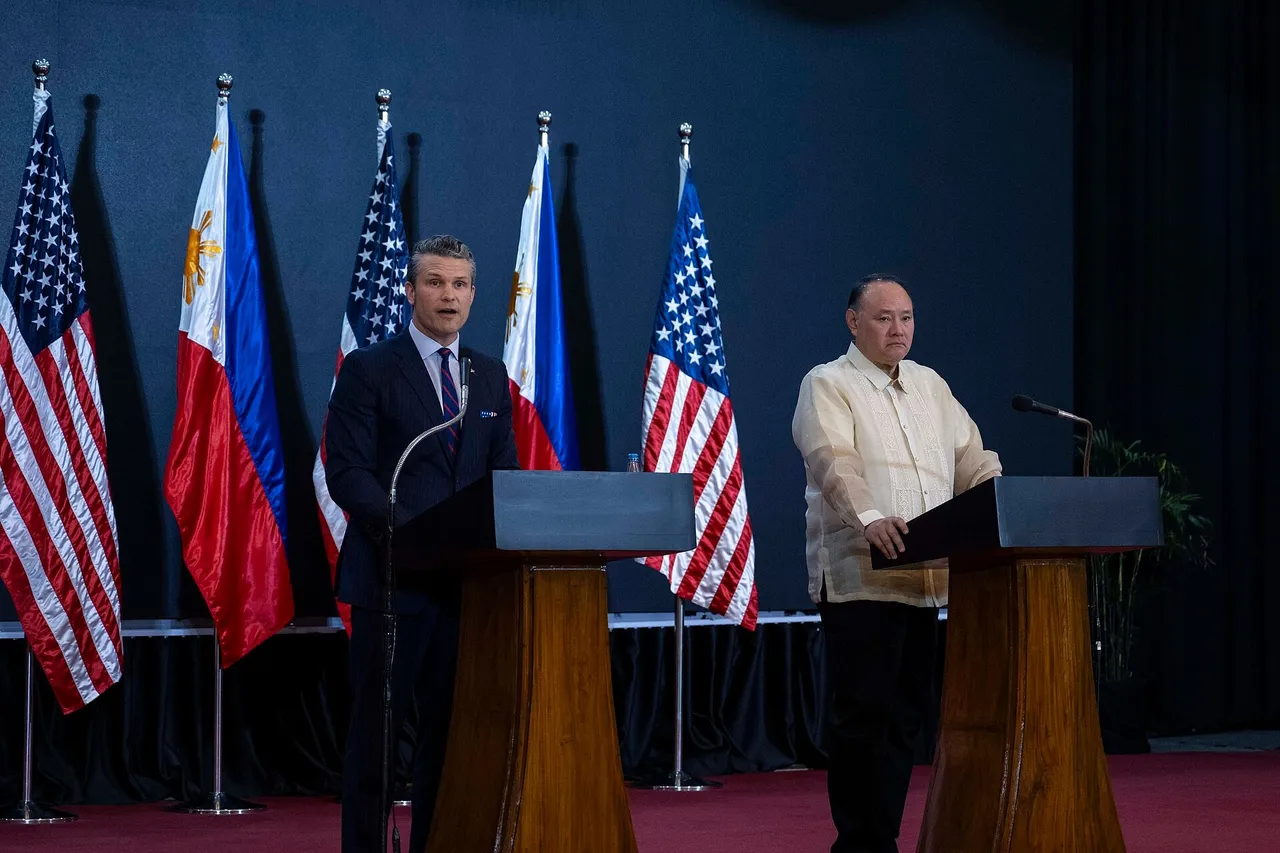 Pete Hegseth and Gilberto Teodoro stand at podiums during a joint press briefing in Manila