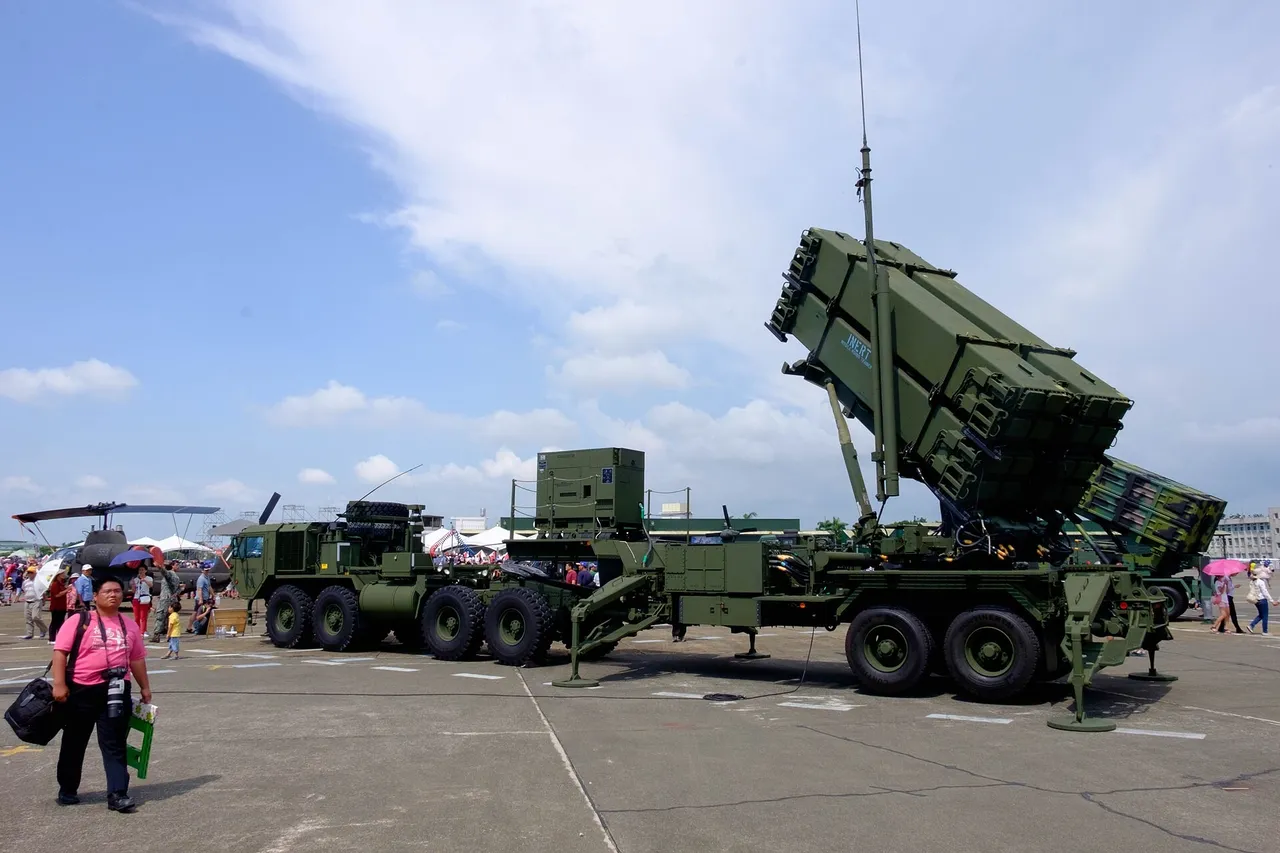 Taiwan Army Patriot missile launcher mounted on a large military truck parked on an air base apron