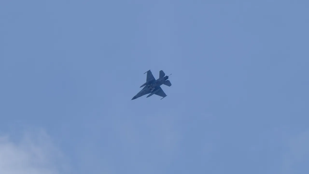 Bottom view of a Republic of China Air Force F-16 fighter flying over Hualien