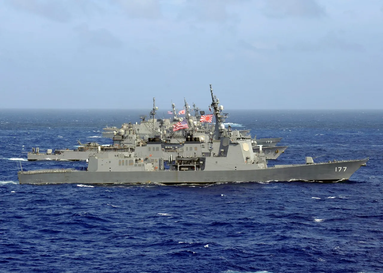 Japanese destroyer JS Atago underway in formation with U.S. Navy ships
