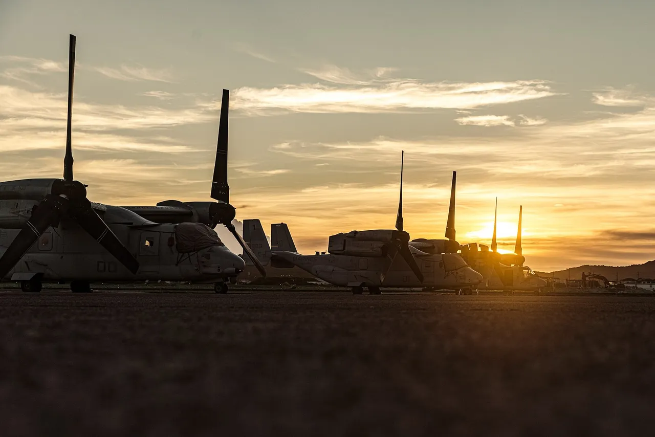 Two US Marine Corps MV-22B Osprey tiltrotors parked on the ramp at Kanoya Air Base in Kagoshima