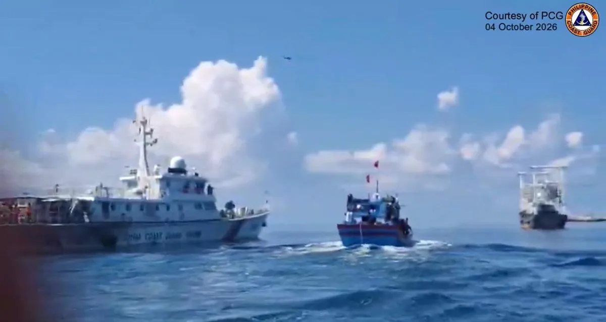 Coast Guard video still of vessels and a helicopter off Pag-asa Island