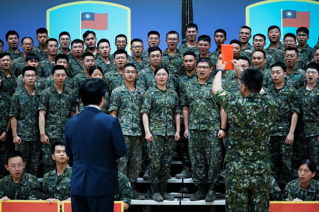 Rows of Taiwanese soldiers in camouflage uniforms stand on risers facing President Lai Ching-te, seen from behind in a dark suit