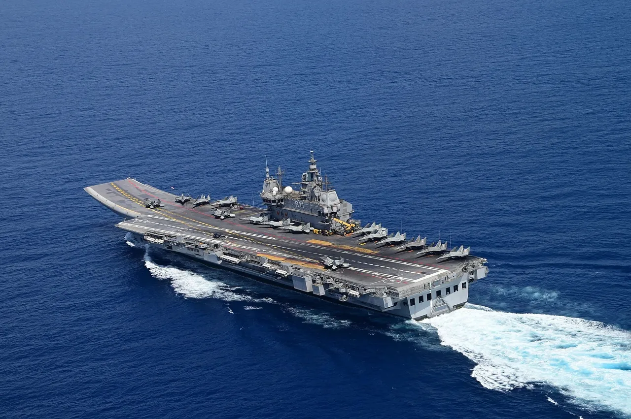 Indian Navy aircraft carrier INS Vikrant sailing at sea with fighter jets on its flight deck