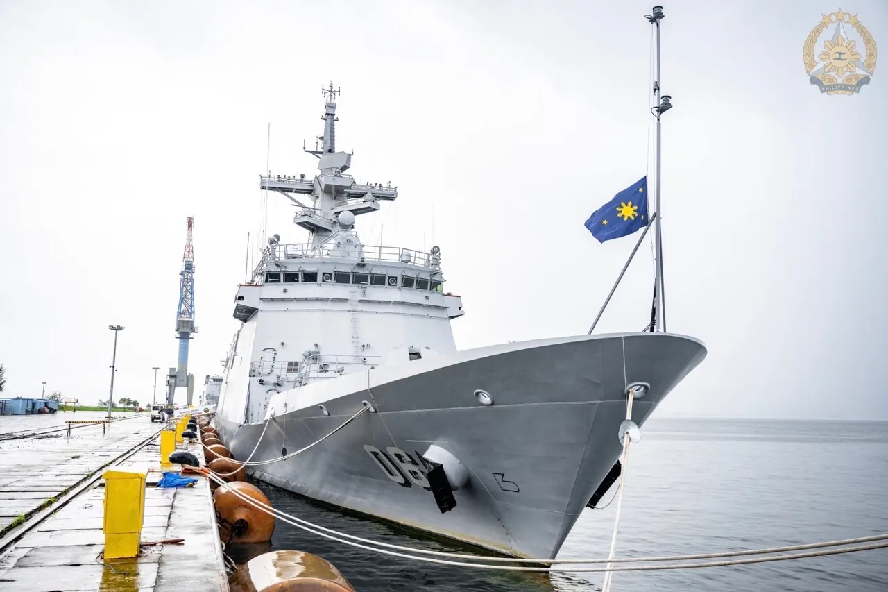 A grey Philippine Navy frigate with hull number 06 moored at a concrete pier under an overcast sky, a Philippine flag flying at its bow