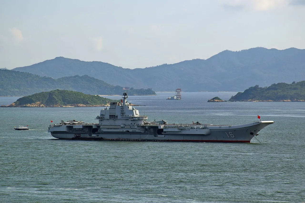 Chinese aircraft carrier Liaoning underway with island superstructure visible