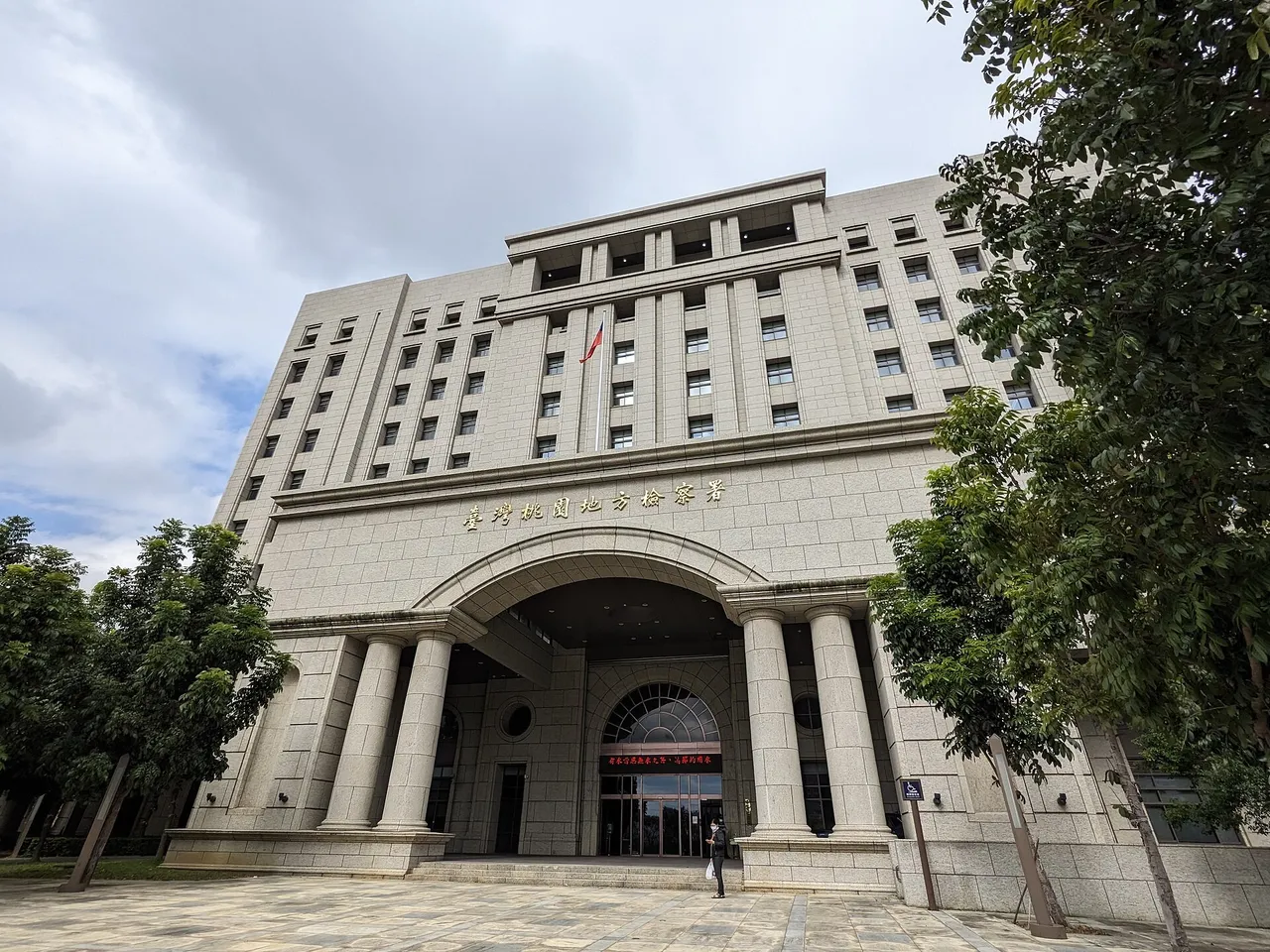 Front of a multi-storey government office building with a paved forecourt in Taoyuan, Taiwan