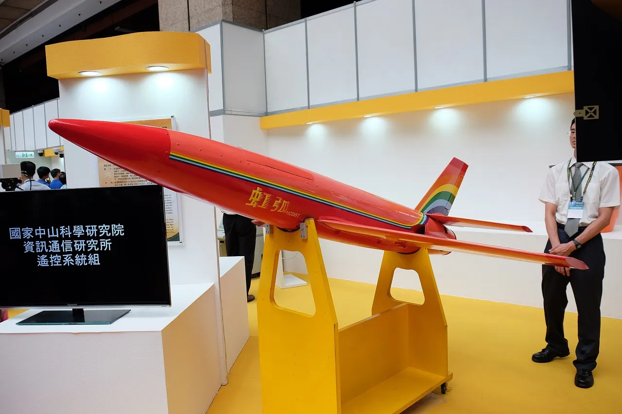 A small grey military target drone on a display stand at a Taipei defence exhibition
